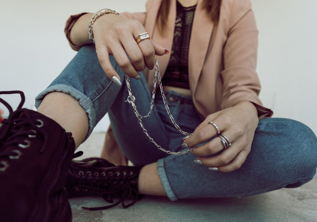 Female holding Jewelry